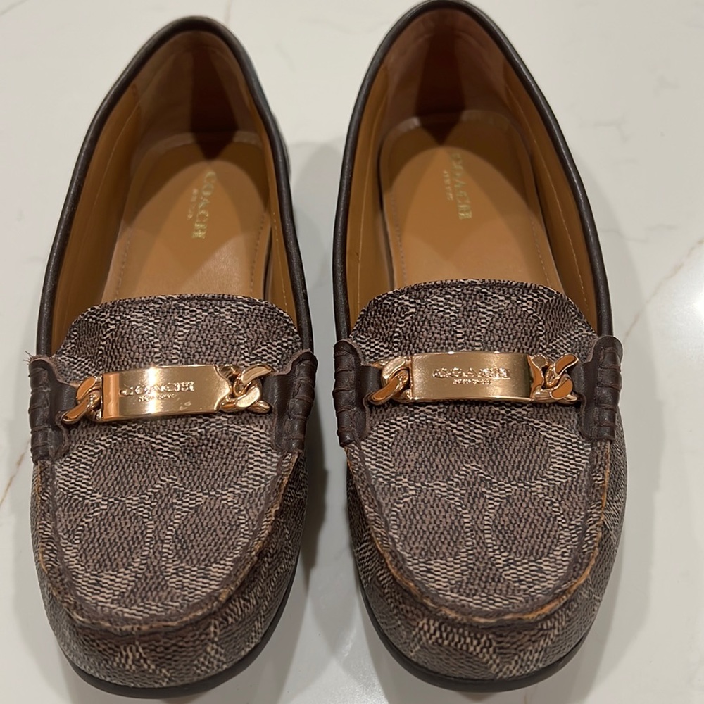 Coach brown loafers. EUC. Only worn a few times. Shows no wear at all.